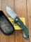 Buck Knife: 2007 Model 395 Medium Buck OMNI Hunter Folding Knife with Camo Handle & Pouch