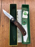 Puma Knife: Puma 1988 model 777 Sport Folding Knife with Walnut Handle Original Box and matching Warranty