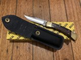 Buck Knife: Buck 2005 Model 110 Hunter Folding Lock Knife with Finger Groove