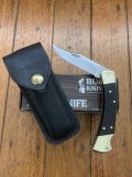 Buck Knife: Buck 1988 Model 110 Hunter Folding Lock Knife with Leather Pouch and Original Box