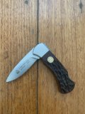 Puma Knife: 2010 Puma 4 Star Mini Folding Lock Knife with Red Jigged Bone Handle