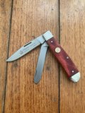 Puma Knife: Puma 2004 Trapper Lockback Knife with Red Smooth Bone Handle