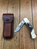 Schrade Vintage Limited Edition USA-Made 100 Year Ducks Unlimited Folding Knife with Sambar Handle and Pouch.