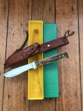 Puma Knife: 1970 Puma Hunters Pal with Light Stag Antler Handle & Yellow & Green Plastic Box