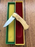 Puma Knife: Puma Original 1979 4 Star Folding Lock Blade Knife with Orange Ivory Micarta Handle in Original Box