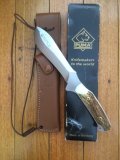 Puma Knife: Puma Rare Original 2001 Light Stag New Hunter Model 118375 in original sheath and box.