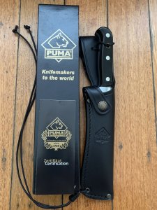 Puma Knife: Puma Special African Cape Buffalo Edition White Hunter with Black Leather Sheath