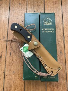 Puma Knife: Puma Original 1994 4 Star Fixed Blade Knife with Black Micarta Handle in Original Green Box