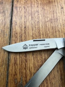 Puma Knife: Puma Trapper Lockback Knife with Green Smooth Bone Handle