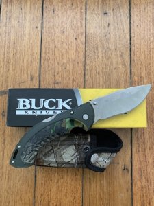 Buck Knife: 2007 Model 397 Large Buck OMNI Hunter Folding Knife with Camo Handle & Pouch