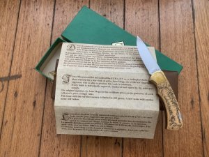 Puma Knife: Puma 1983 Original 4 Star Folding Lock Blade Scrimshawed Roaring Red Stag Knife with in Presentation Box #71/300
