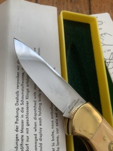 Puma Knife: Puma Original 1982 4 Star Folding Lock Blade Knife with Ivory Micarta Handle in Original Box #16281