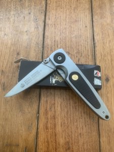 Puma Knife: Puma HUNTEC II Plain Edge Black Handled Linerlock Folding Knife in Puma Box