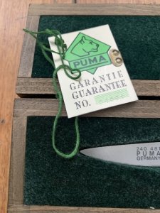 Puma Knife: Puma 1990 Asian Wildlife Collection 'Big Horn Sheep' model SATELITE Folding Knife with Ebony Handle Original Box and matching Warranty #169/200