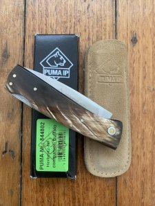 Puma Knife: Puma IP Companion Folding Knife with Buffalo Horn Handle and Pouch