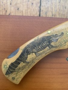 Puma Knife: Puma Original Scrimshawed Puma Aligator 4 Star Folding Lock Blade Knife with Presentation Box
