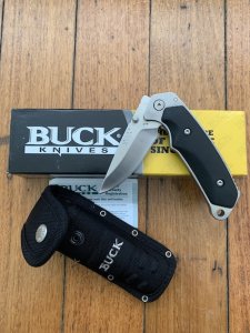 Buck Knife: 2006 Model Buck Alpha Hunter Folding Knife with Black Rubberised Handle & Pouch
