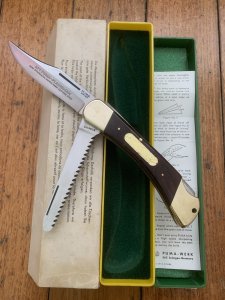 Puma Rare Model 971 Plainsman 1969 Saw and Blade Folding Knife with original box & Paperwork #96011