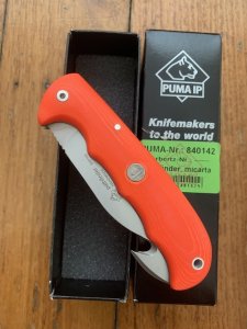 Puma Knife: Puma IP Pathfinder with gut hook, Orange Micarta Handle