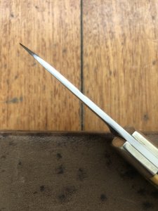 Puma Knife: Puma 1987 Original Scrimshawed 4 Star Folding Lock Blade Knife with Cape buffalo in Presentation Box