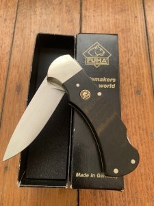 Puma Knife: Puma Original 1981 4 Star Folding Lock Blade Knife with Ebony Micarta Handle #15181