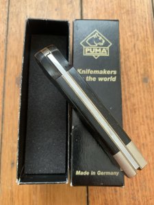 Puma Knife: Puma Original 1981 4 Star Folding Lock Blade Knife with Ebony Micarta Handle #15181