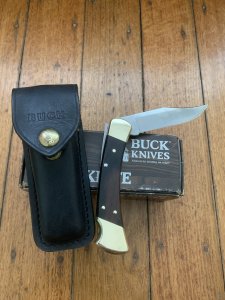 Buck Knife: Buck 1988 Model 110 Hunter Folding Lock Knife with Leather Pouch and Original Box