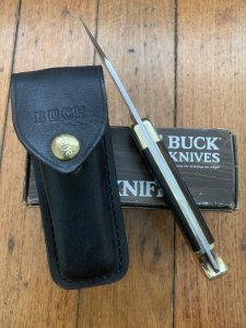 Buck Knife: Buck 1988 Model 110 Hunter Folding Lock Knife with Leather Pouch and Original Box