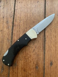 Puma Knife: Puma Original 1977 4 Star Folding Lock Blade Knife with Black Ebony Micarta Handle #29771