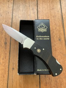 Puma Knife: Puma Original 1981 4 Star Folding Lock Blade Knife with Ebony Micarta Handle #15181