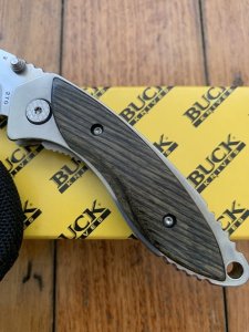 Buck Knife: 2005 Buck B270 Dorado Folding Liner Lock Knife with Charcoal Birchwood Laminated Handle, Pouch and Original Box