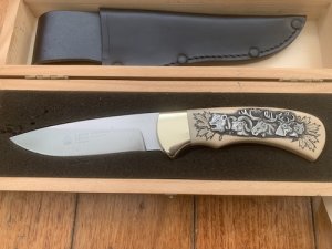 Puma Knife: Puma 1990 American Wildlife Collection 4 star Fixed Blade Knife with White Micarta Handle Original Box and matching Warranty #025/400