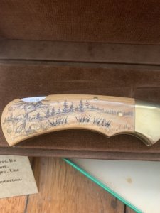 Puma Knife: Puma 1983 Original 4 Star Folding Lock Blade Scrimshawed Roaring Red Stag Knife with in Presentation Box #71/300