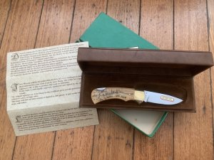 Puma Knife: Puma 1983 Original 4 Star Folding Lock Blade Scrimshawed Roaring Red Stag Knife with in Presentation Box #71/300