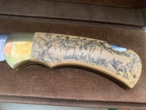 Puma Knife: Puma 1983 Original 4 Star Folding Lock Blade Scrimshawed Roaring Red Stag Knife with in Presentation Box #71/300