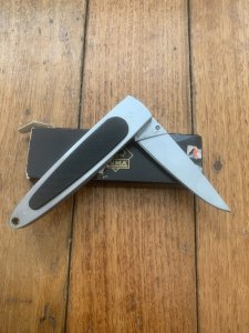 Puma Knife: Puma HUNTEC II Plain Edge Black Handled Linerlock Folding Knife in Puma Box