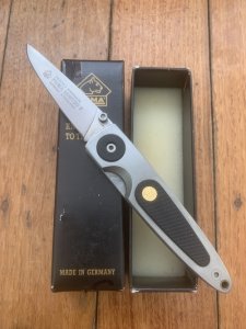 Puma Knife: Puma HUNTEC II Plain Edge Black Handled Linerlock Folding Knife in Puma Box