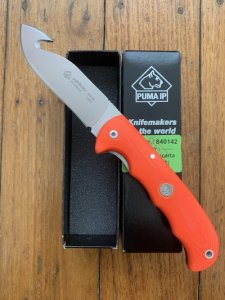 Puma Knife: Puma IP Pathfinder with gut hook, Orange Micarta Handle