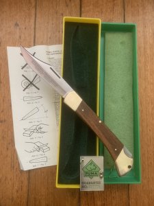 Puma Knife: Puma 1982 Trail Boss/Emperor 975 Folding Knife with Jacaranda Handle Original Box and matching Warranty
