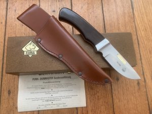 Puma Knife: 12 6010 Puma Austrian SkinMaster Centenary Knife 996-1996 with Walnut Handle 79/200