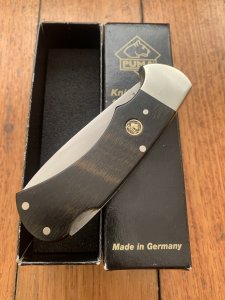 Puma Knife: Puma Original 1981 4 Star Folding Lock Blade Knife with Ebony Micarta Handle #15181