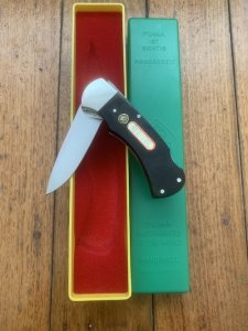 Puma Knife: Puma Original 1979 4 Star Folding Lock Blade Knife with Black Ebony Micarta Handle in Original Box #13971