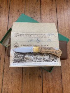 Puma Knife: Puma 1983 Original 4 Star Folding Lock Blade Scrimshawed Roaring Red Stag Knife with in Presentation Box #71/300