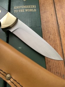 Puma Knife: Puma Original 1994 4 Star Fixed Blade Knife with Black Micarta Handle in Original Green Box