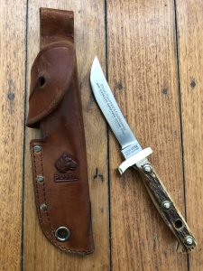 Puma Knife: Puma 11 6385 Original Right 1968 Hand  Trappers Companion in original Tan sheath