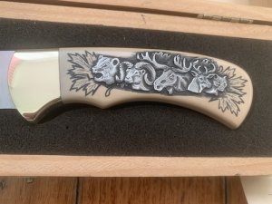 Puma Knife: Puma 1990 American Wildlife Collection 4 star Fixed Blade Knife with White Micarta Handle Original Box and matching Warranty #025/400