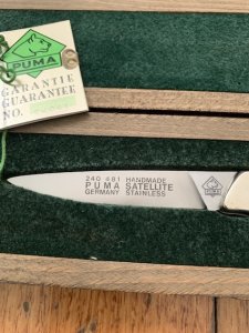 Puma Knife: Puma 1990 Asian Wildlife Collection 'Big Horn Sheep' model SATELITE Folding Knife with Ebony Handle Original Box and matching Warranty #169/200