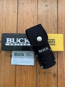 Buck Knife: 2006 Model Buck Alpha Hunter Folding Knife with Black Rubberised Handle & Pouch