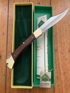 Puma Knife: Puma 1980 Trail Boss/Emperor 975 Folding Knife with Jacaranda Handle Original Box and matching Warranty