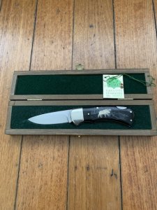 Puma Knife: Puma 1990 American Wildlife Collection 'Moose' model 715 4 star Folding Knife with Ebony Handle Original Box and matching Warranty #169/200